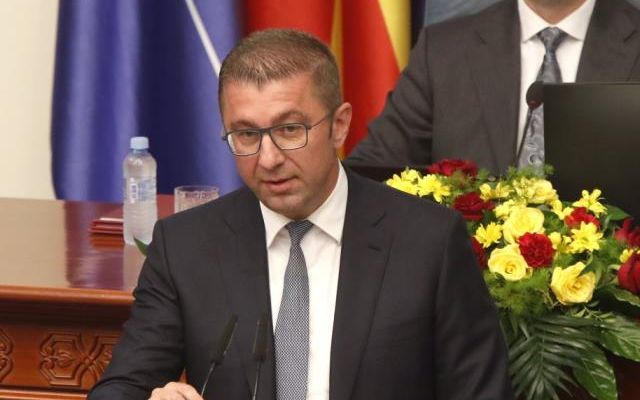 Hristijan Mickoski speaks to lawmakers during a session in the parliament building in Skopje, North Macedonia, Sunday, June 23, 2024. (AP File Photo)